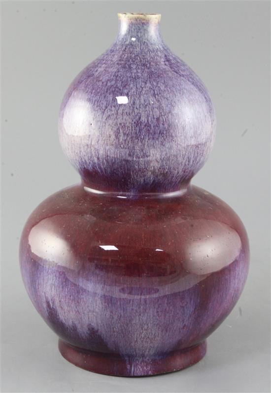 A Chinese flambe glazed double gourd vase, late 19th / early 20th century, 27cm, tiny rim chips